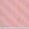 Tissu graphique doré fond rose 100% coton