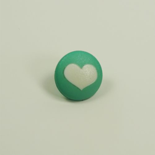 Bouton vert motif coeur Bouton vert motif coeur