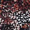 Tissu jersey viscose taches colorées fond noir