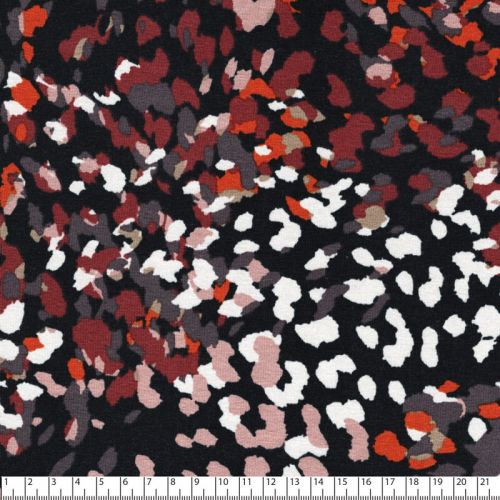 Tissu jersey viscose taches colorées fond noir Tissu jersey viscose taches colorées fond noir