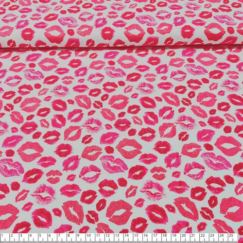 Tissu jersey bisous rose glitter fond blanc Tissu jersey bisous rose glitter fond blanc