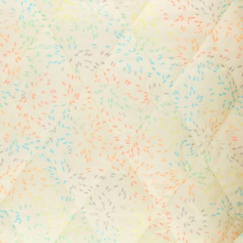 Tissu doudoune matelassé feux d'artifice fond écru Tissu doudoune matelassé feux d'artifice fond écru