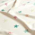 Tissu maillot de bain étoiles fond écru UPF50