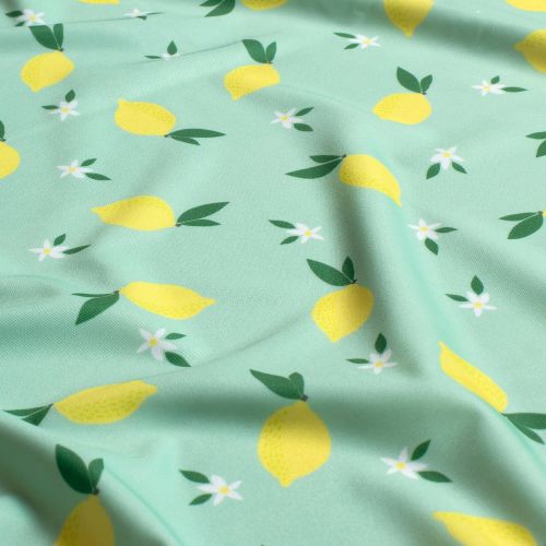 Tissu maillot de bain citrons fond vert UPF50 Tissu maillot de bain citrons fond vert UPF50