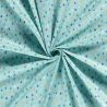 Tissu coton minis sapins fond menthe